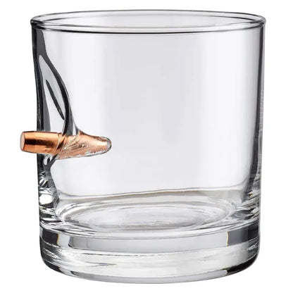 Clear BenShot Rocks Glass with copper bullet embedded in its side