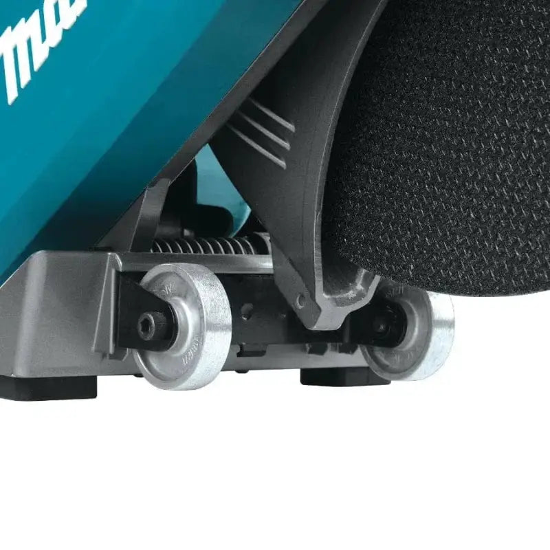 Close-up of Makita GEC01PL 80V XGT power tool’s adjustment rollers and housing details