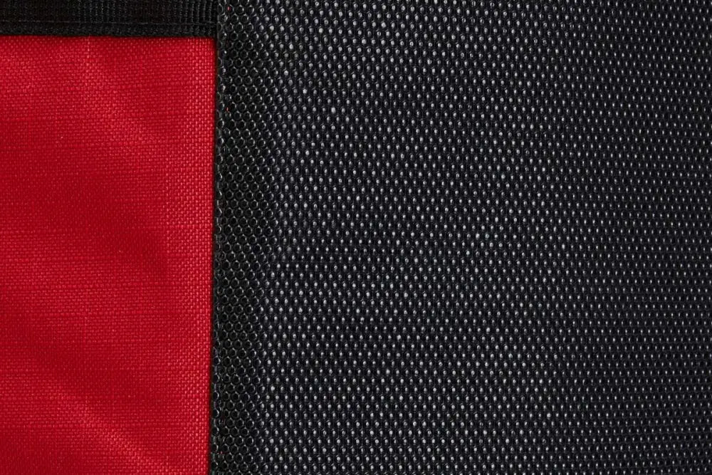 Close-up of red and black fabric on Firefighter XXL Turnout Gear Bag with yellow trim