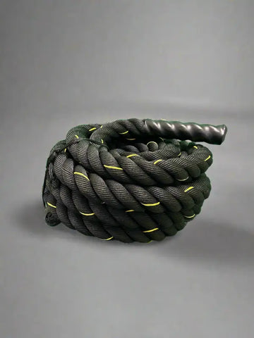 Coiled black firefighter battle rope with yellow accents and textured handle for first responders