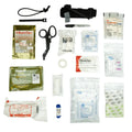 Collection of first aid supplies in Ranger Green Molle-Compatible Pouch for North American Rescue