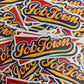 Job Town sticker with blue and yellow retro lettering on red background, inspired by Ball Park Frank