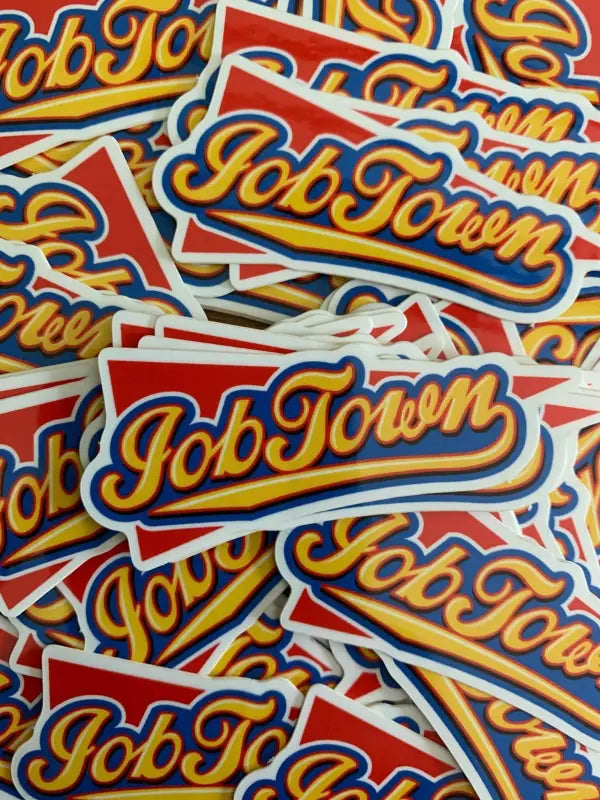 Job Town sticker with blue and yellow retro lettering on red background, inspired by Ball Park Frank