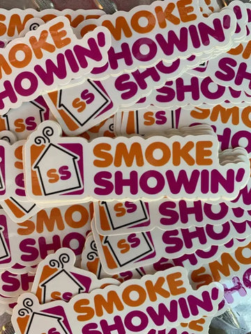 Collection of Smoke Showin stickers in orange and purple with house icons for firefighters