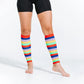 Colorful striped calf compression sleeves paired with black shorts in multicolor style