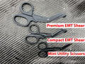 Three black Compact Trauma Shears and utility scissors in parallel layout by Maratac