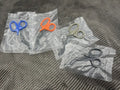 Four colorful Compact Trauma Shears Gen 3 By Maratac on clear plastic bags