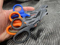 Three pairs of Compact Trauma Shears Gen 3 By Maratac with colored handles