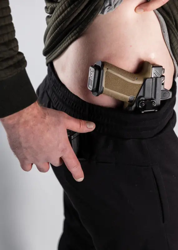 Concealed handgun with patented carrier retention in Carrier Joggers Mk.II - Midnight Black