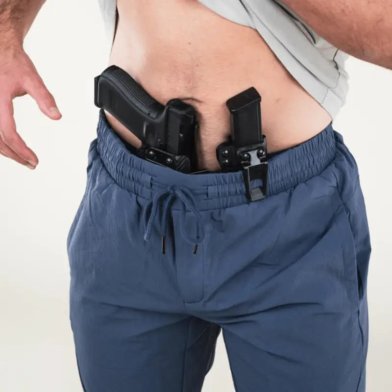 Concealed handgun and magazine in Carrier Traveler Joggers with carrier retention waistband