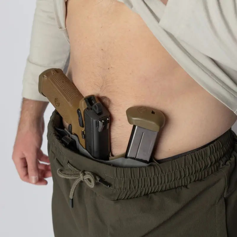 Concealed handgun and magazine in Carrier Traveler Joggers with carrier retention waistband