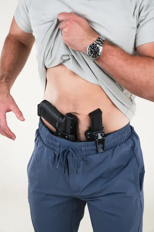 Concealed handgun and magazine in Carrier Traveler Joggers with carrier retention waistband