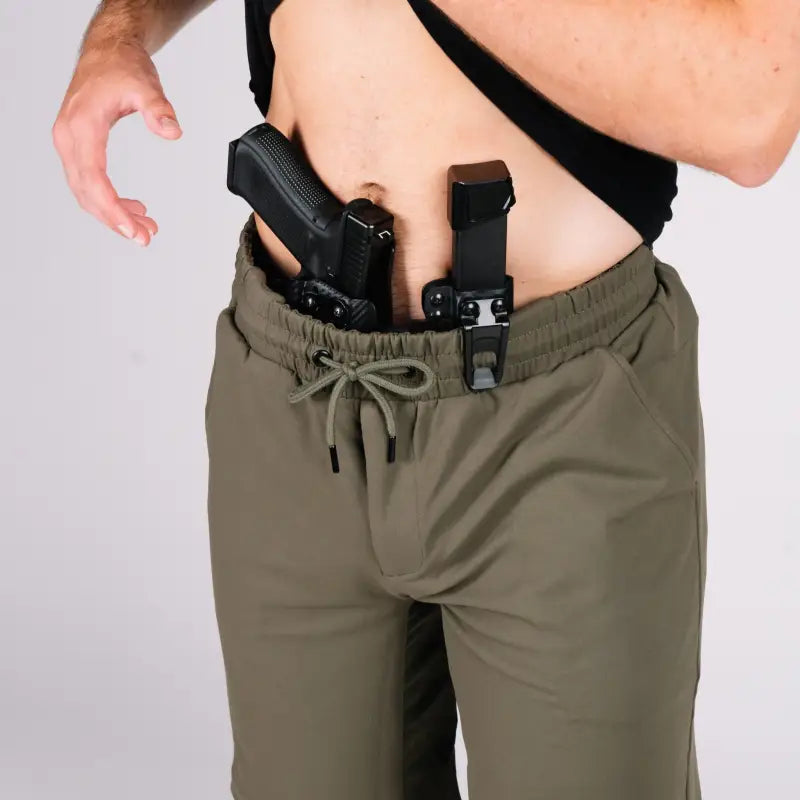 Concealed carry handgun and magazine in Arrowhead Tactical Apparel Carrier Shorts Mk.II Olive Drab