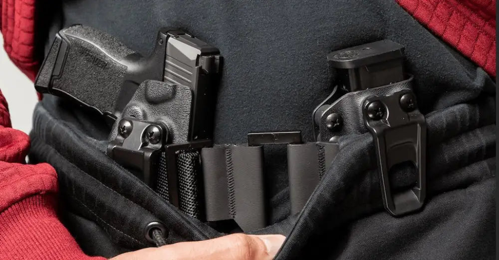 Concealed handgun and magazine holsters with OmniCarry Retention Belt for secure carry