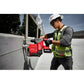 Construction worker using Milwaukee 2915-20 M18 Fuel rotary hammer on metal railing