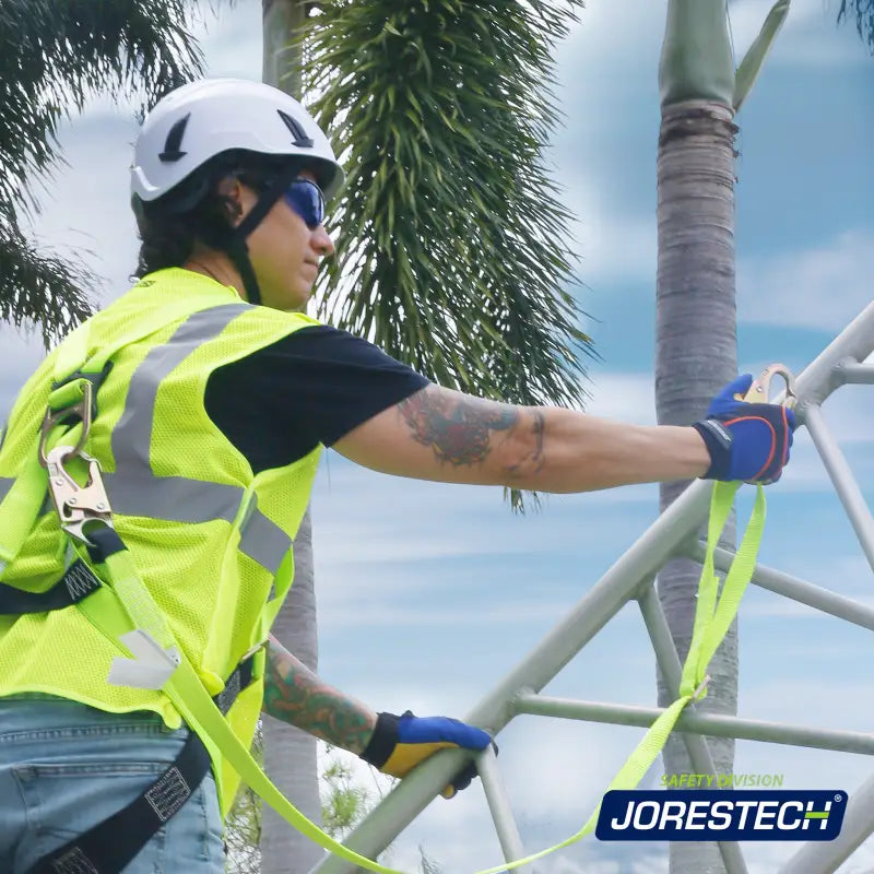 Construction worker in safety gear using an Adjustable Work Positioning Lanyard