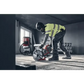 Construction worker in safety gear using Husqvarna K 1 PACE Battery Powered Rescue Power Cutter