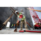 Construction worker in safety gear using Milwaukee 2916-20 M18 FUEL D-Handle Rotary Hammer