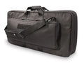 Black padded discreet rifle case with shoulder strap and exterior pockets for covert operations