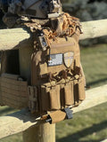 Coyote brown tactical vest with patches including American flag and Redemption Tactical medical kit body armor
