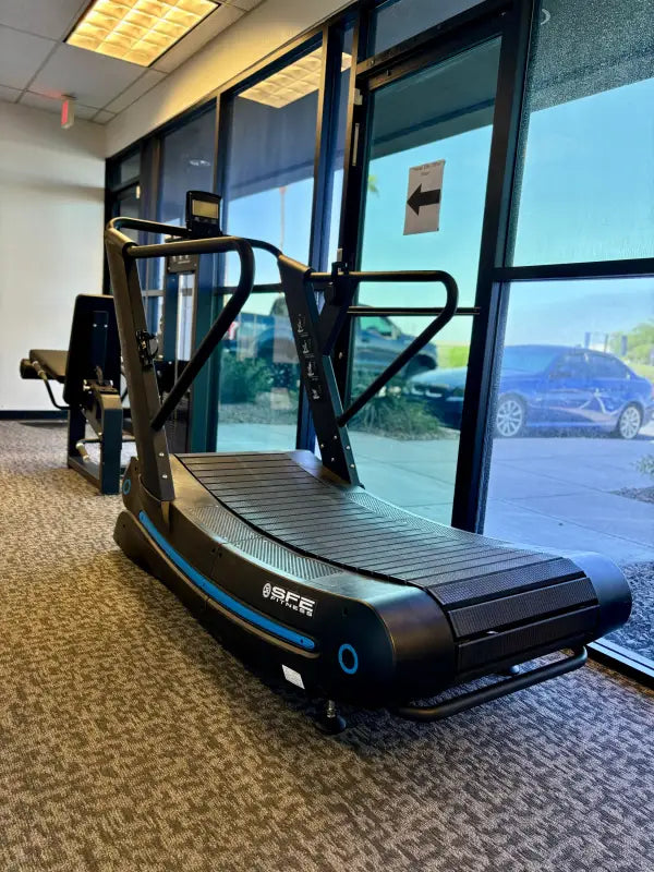 Curved manual treadmill with digital display for first responders, firefighters, police