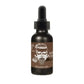 Dark glass dropper bottle of Shift Change Coffee Vanilla Beard Oil with skull label