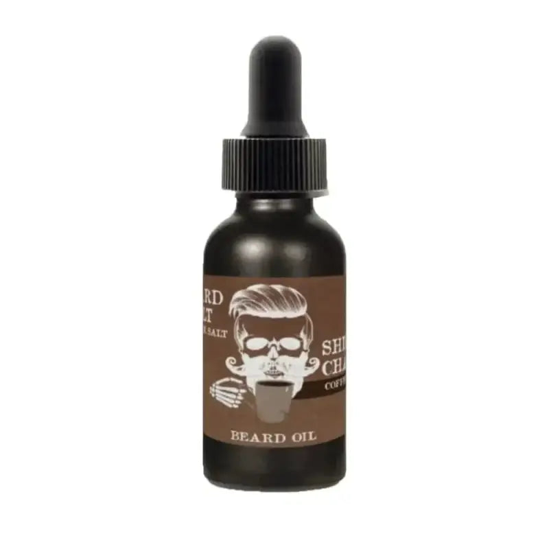 Dark glass dropper bottle of Shift Change Coffee Vanilla Beard Oil with skull label