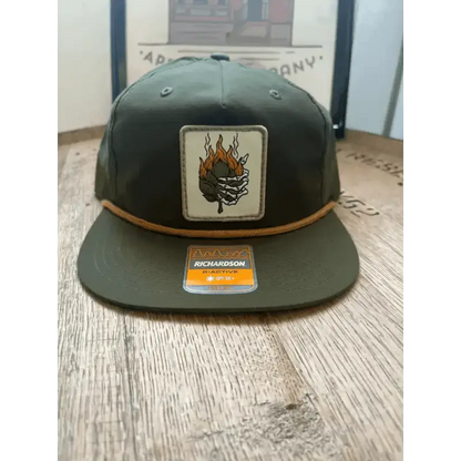 Dark green Smokin Hop Brewery hat with flaming basketball patch and orange cord