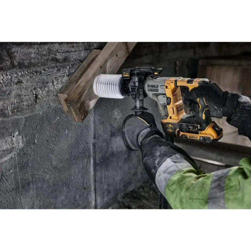 DeWalt DCH172D2 Atomic 20V Max Brushless Cordless SDS drill in use with bit attachment