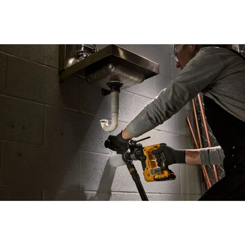 DeWalt DCH072B XTREME 12V MAX Brushless Cordless Rotary Hammer used on plumbing pipes