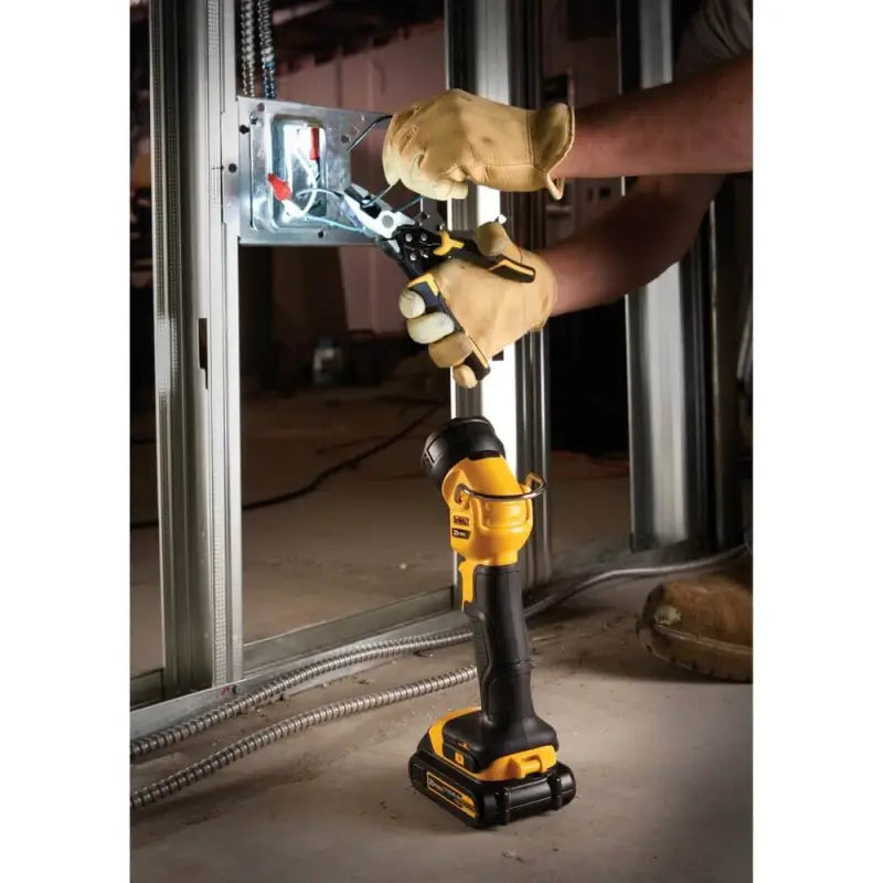 DeWalt power drill with gold drill bit attachment alongside DCL040 20V MAX LED Work Light