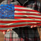 Distressed American Battle Flag metal wall art features a tattered red silver blue design