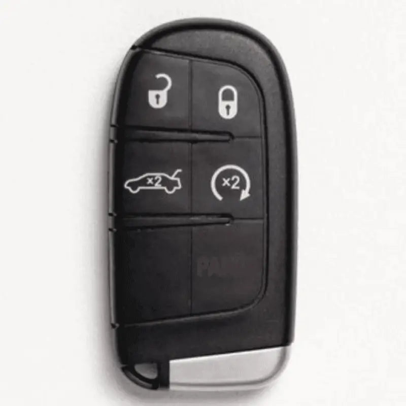 Black Dodge key fob with four buttons in a durable key fob holder, coyote brown