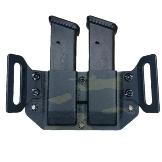 Double magazine carrier with black Kydex construction and belt loops for Glock 9/40/357