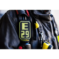 E29 patch on dark firefighting gear for IdentiFire SCBA Accountability Shoulder Strap System