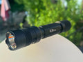 Black tactical LED flashlight with ridged design, Powertac E9 Gen5 3,000 lumen EDC