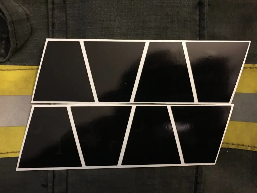 Eight black trapezoid panels with white borders for Carolina Flag Reflective Helmet