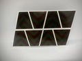 Eight black triangular panels with white borders for a Yellow Chevron Reflective Helmet