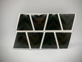 Eight black triangular shapes with white borders in a Yellow Chevron Reflective Helmet pack