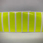 Eight Retro Fluorescent Yellow Reflective Helmet Bar stickers arranged in a row