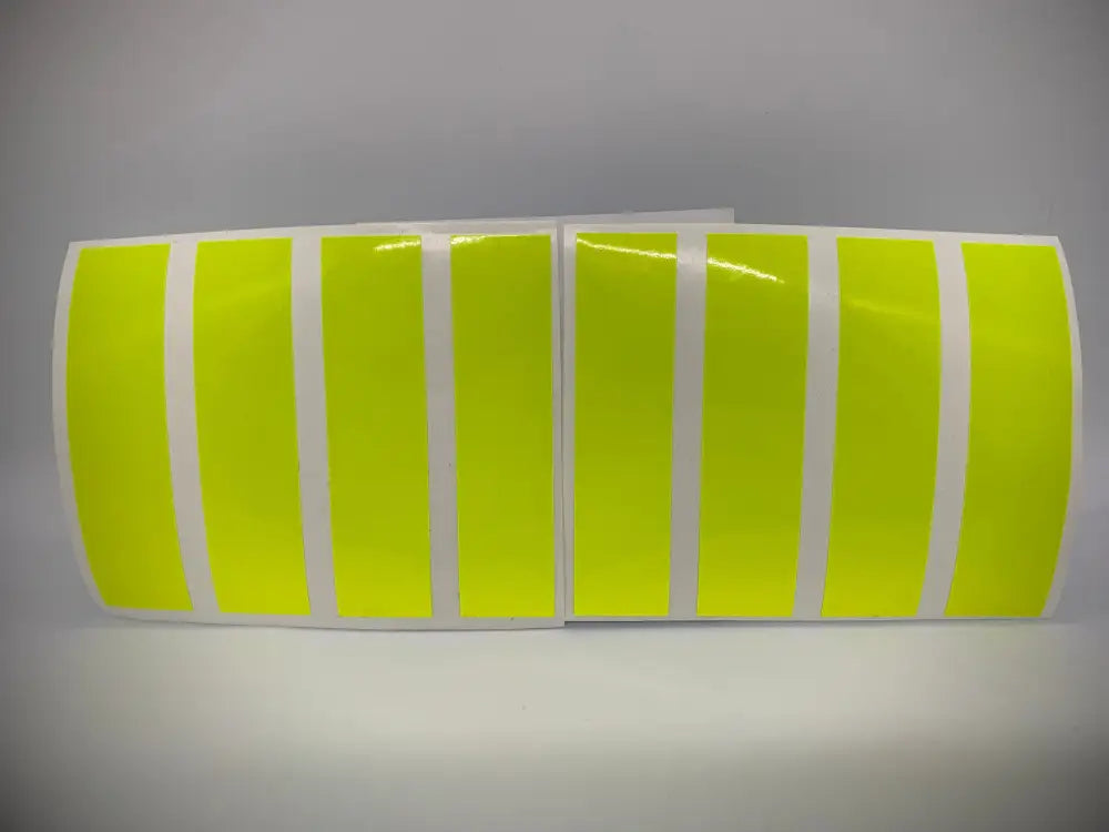 Eight Retro Fluorescent Yellow Reflective Helmet Bar stickers arranged in a row