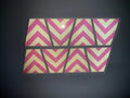 Eight pink chevron reflective tiles in two rows for the Chevron Reflective Helmet