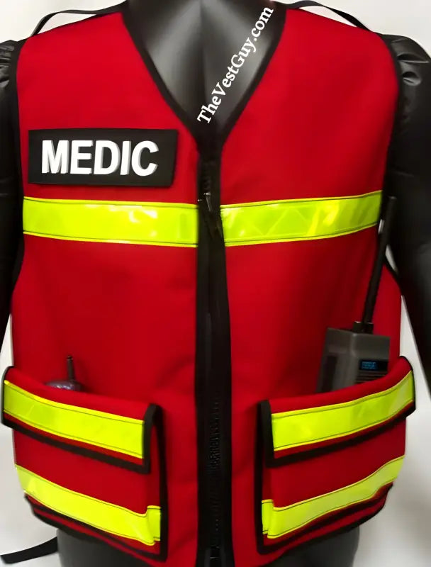 Red EMS reflective vest with lower pockets and ’MEDIC’ patch for emergency services