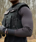 Black tactical Equinoxx Stage 3 vest carrier with multiple pouches and attachments