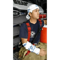 Firefighter in turnout gear uses Subzero Cooling Towel with H2O Heat Barrier technology