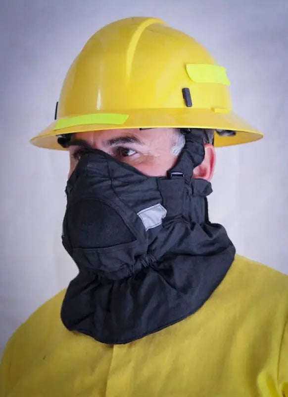 Firefighter wearing protective gear with Hot Shield HS-2 Wildland Face Mask, ash particulate blocking
