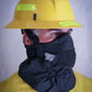 Firefighter wearing protective Hot Shield HS-2 Wildland Firefighter Face Mask resisting ash particulate