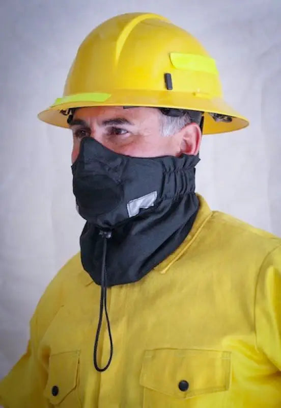 Firefighter wearing protective gear with Hot Shield UB-V2 Wildland Firefighter Ultimate Bandanna