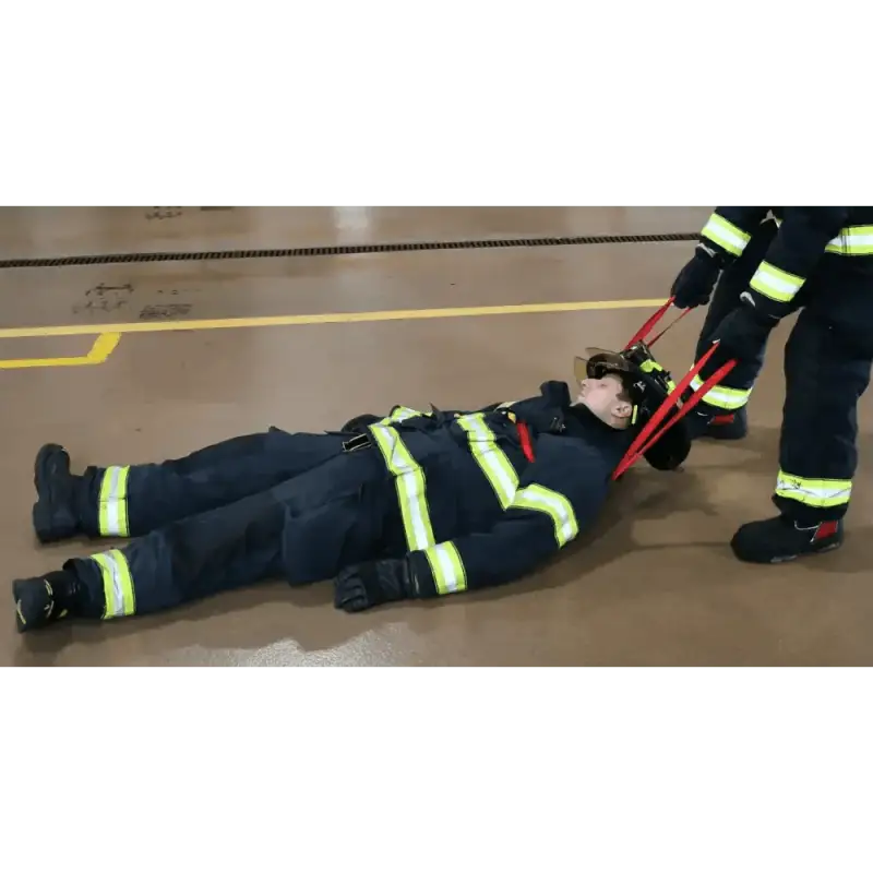 Firefighters using multi-use sewn webbing loop for rescue and safety training exercise