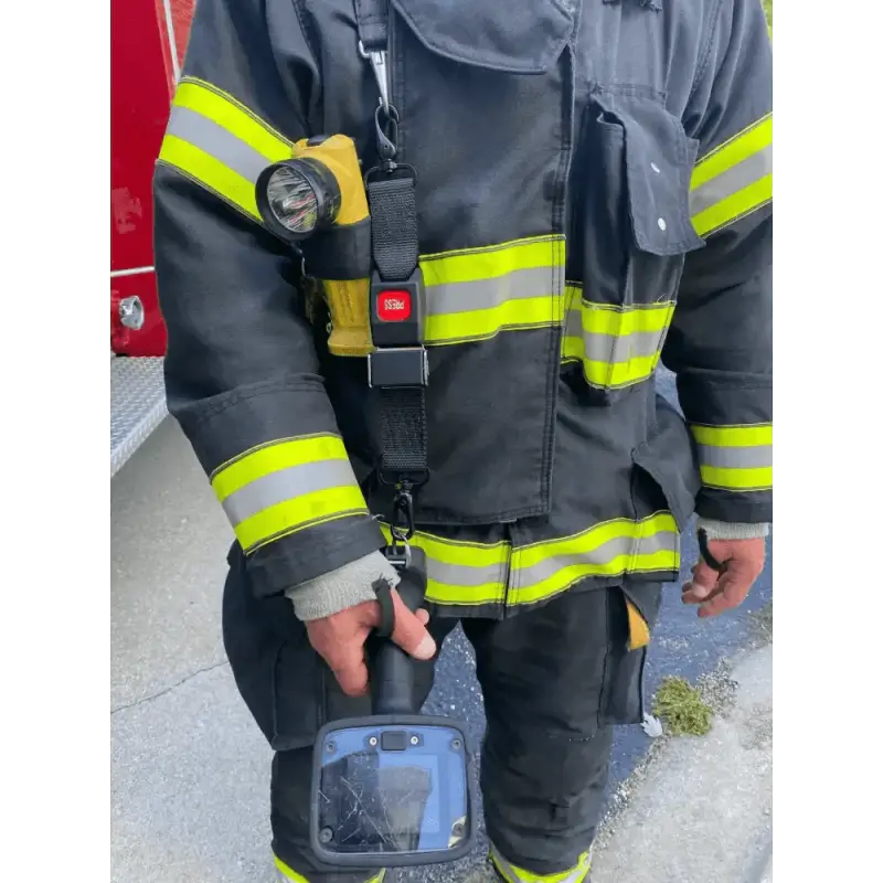 Firefighter in protective gear with TIC Strap - FFTIC for first responders safety